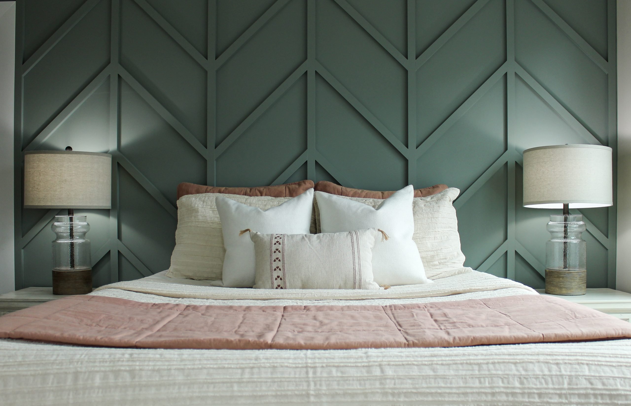 Bedroom remodeling with lattice wall design and green color drenched wall in a Pacific Palisades, California interior home redesign project staged by Jennifer Donahue Interior Design Inc.