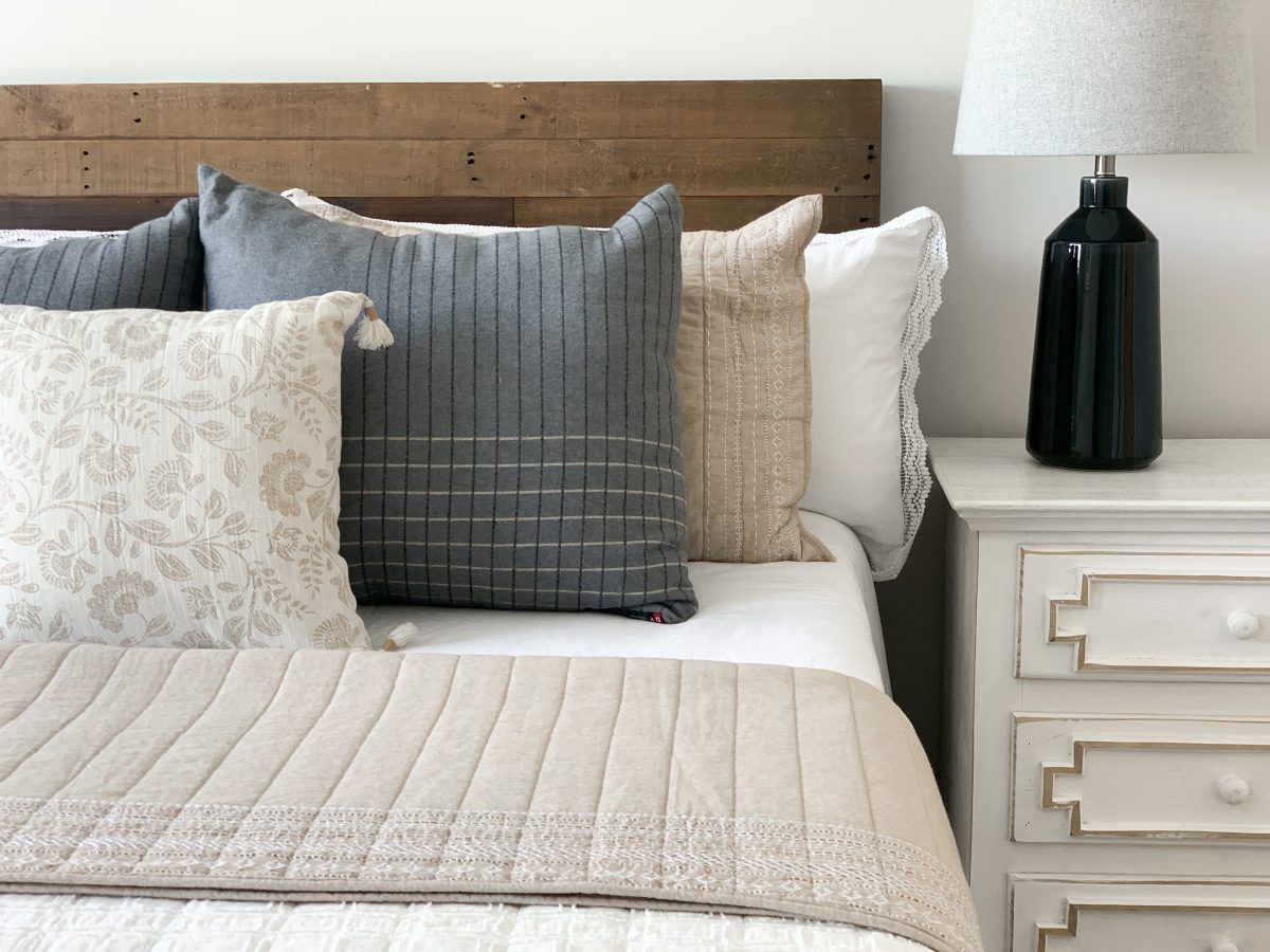 Close up of bedroom decor and nightstand styling in Ohio home.