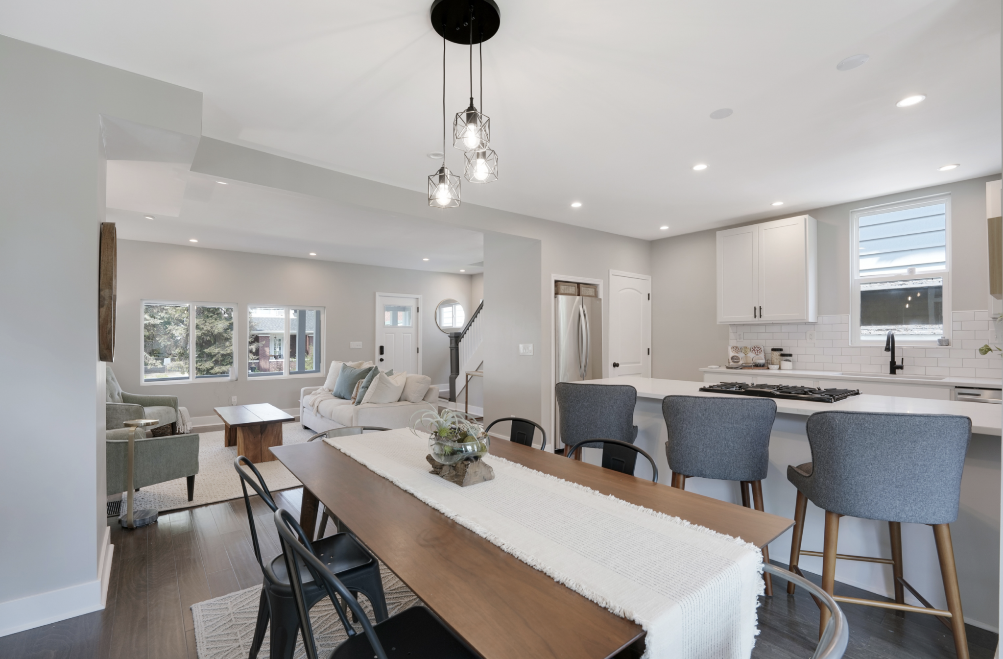 Wide angle shot of a remodeled home in downtown Pacific Palisades, California staged by top staging company, Jennifer Donahue Interior Design Inc.