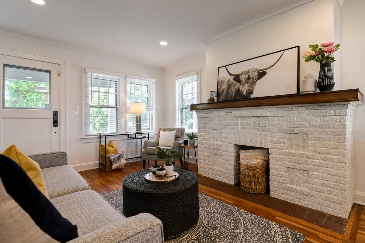 Converted decorative fireplace and hardwood floors in this classic Franklinton home in downtown Columbus.
