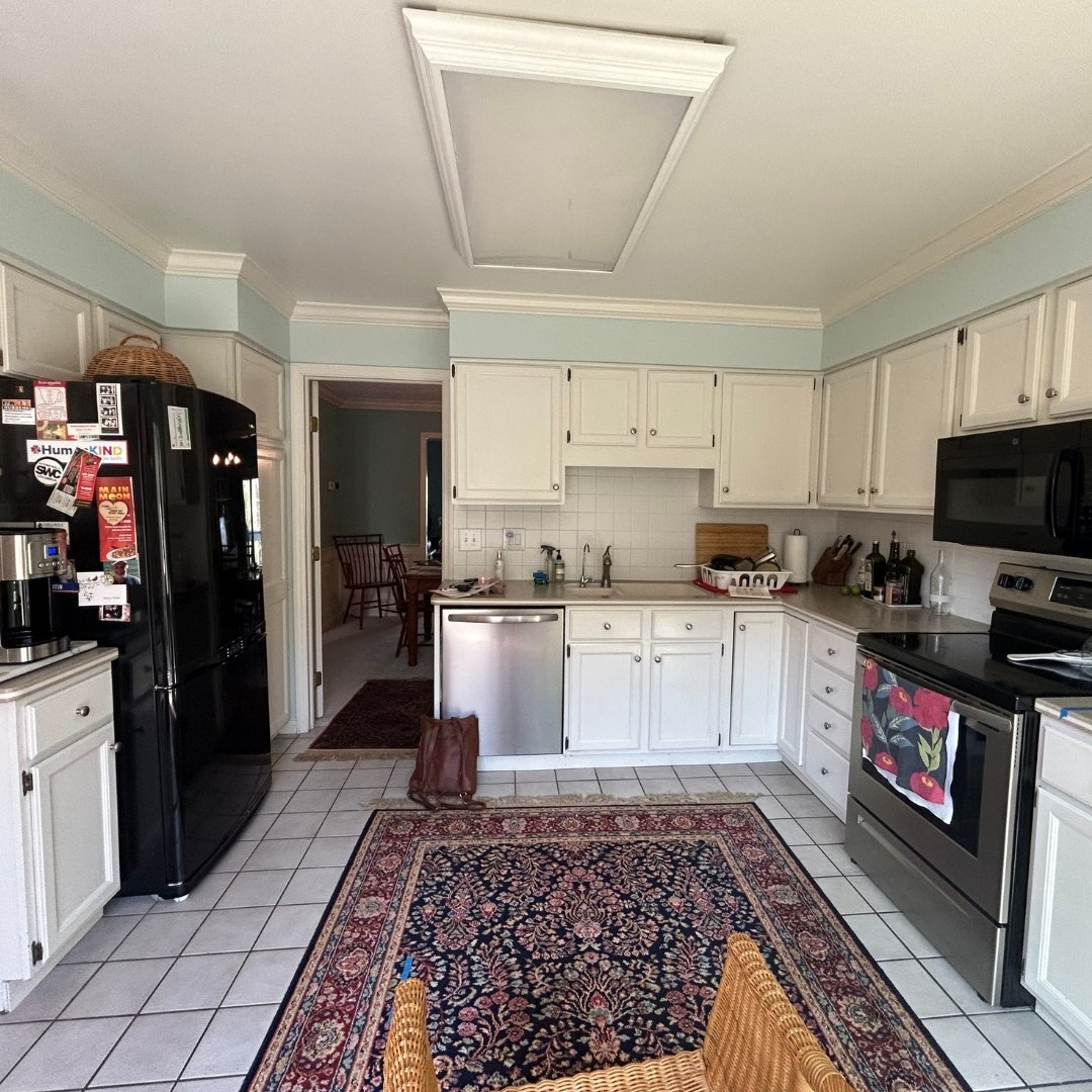 A kitchen before a complete remodel in central Ohio home. The designers at Jennifer Donahue Interior Design Inc were consulted to lead on the selection of color, tile, cabinetry and fixture for this home remodel/interior design project.