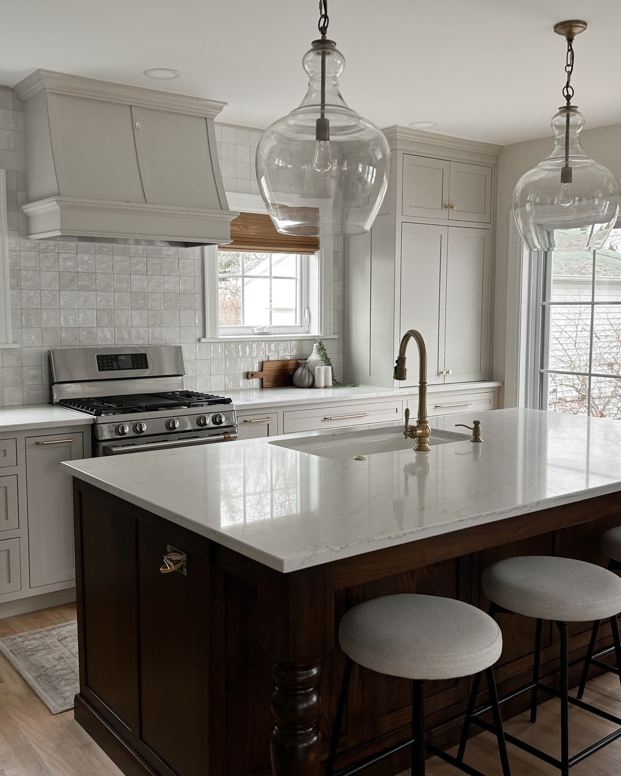 Custom white kitchen countertops installed for residential interior design client.