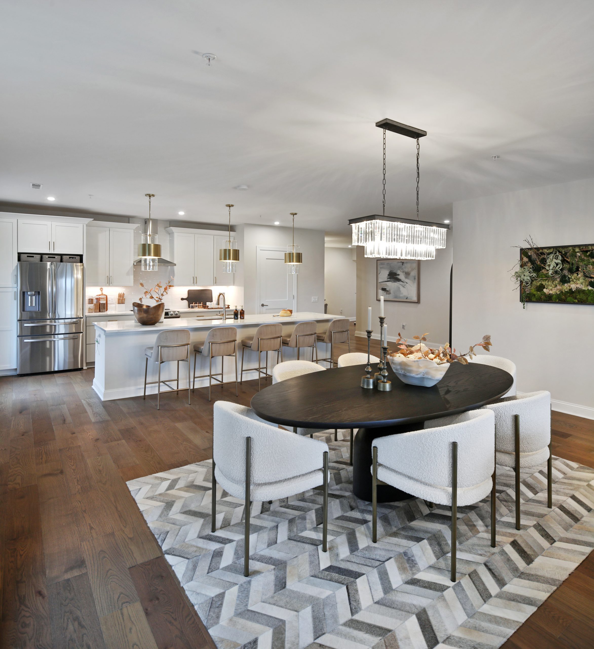 High countertop stools on at kitchen island countertops in luxury condo.
