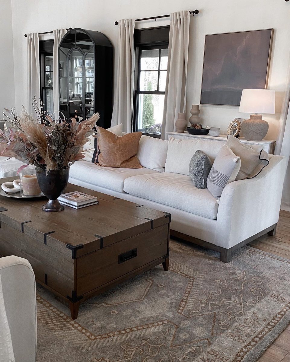 Luxury living room interior design project showcasing large modern sofas, oversized coffee tables and modern table decor.