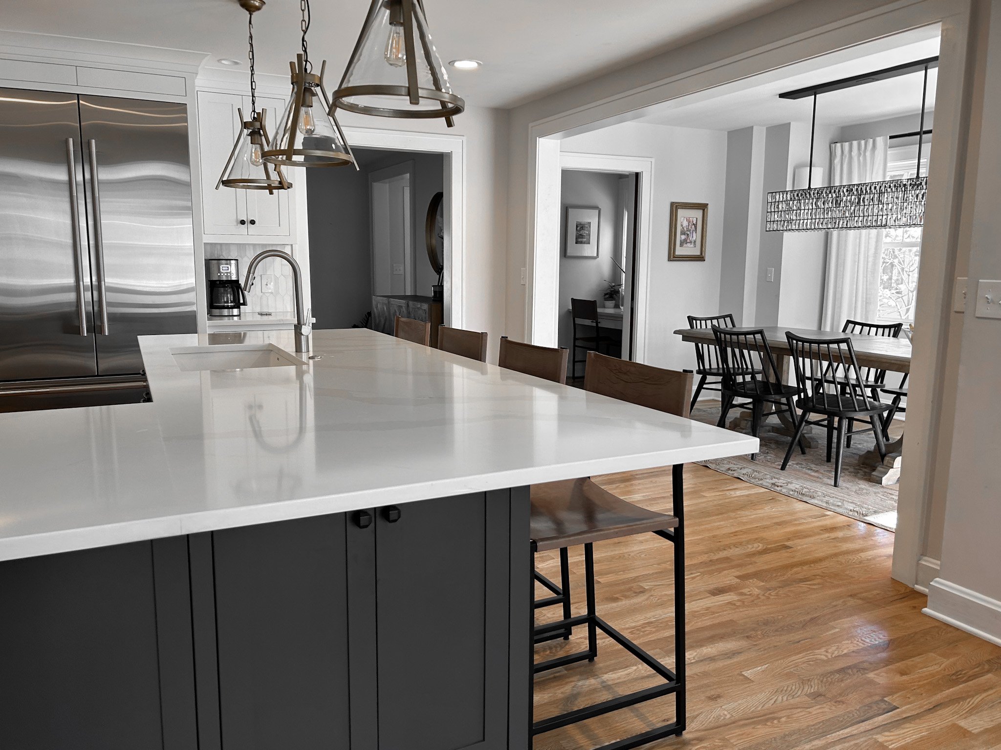 Overlooking from kitchen into the dining room of this Pacific Palisades, California interior design client completed by Jennifer Donahue Interior Design Inc.