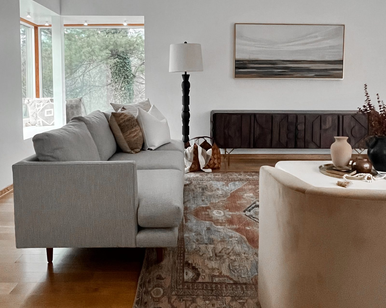 Mid century modern decor in Pacific Palisades, California home creates unique shapes and lines in a living room