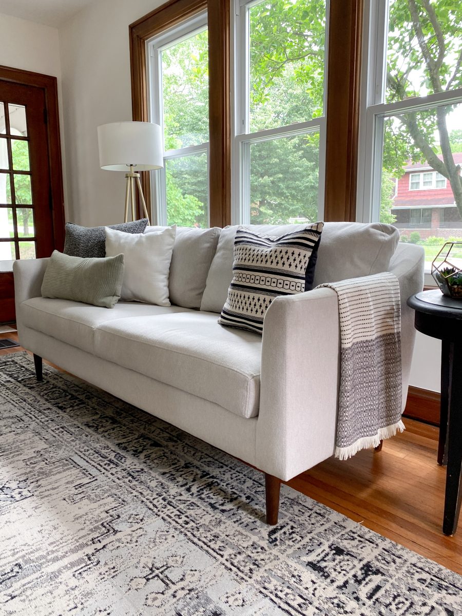 Modern living room sofa and throw pillows in a classic remodeled home in Clintonville, Ohio.