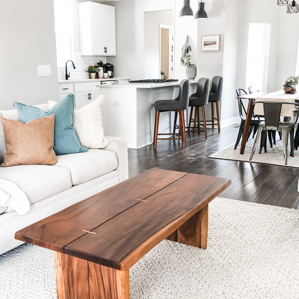 Renovated home in the Southern Orchards neighborhood of Pacific Palisades, California features live edge coffee table and contemporary farmhouse decor.
