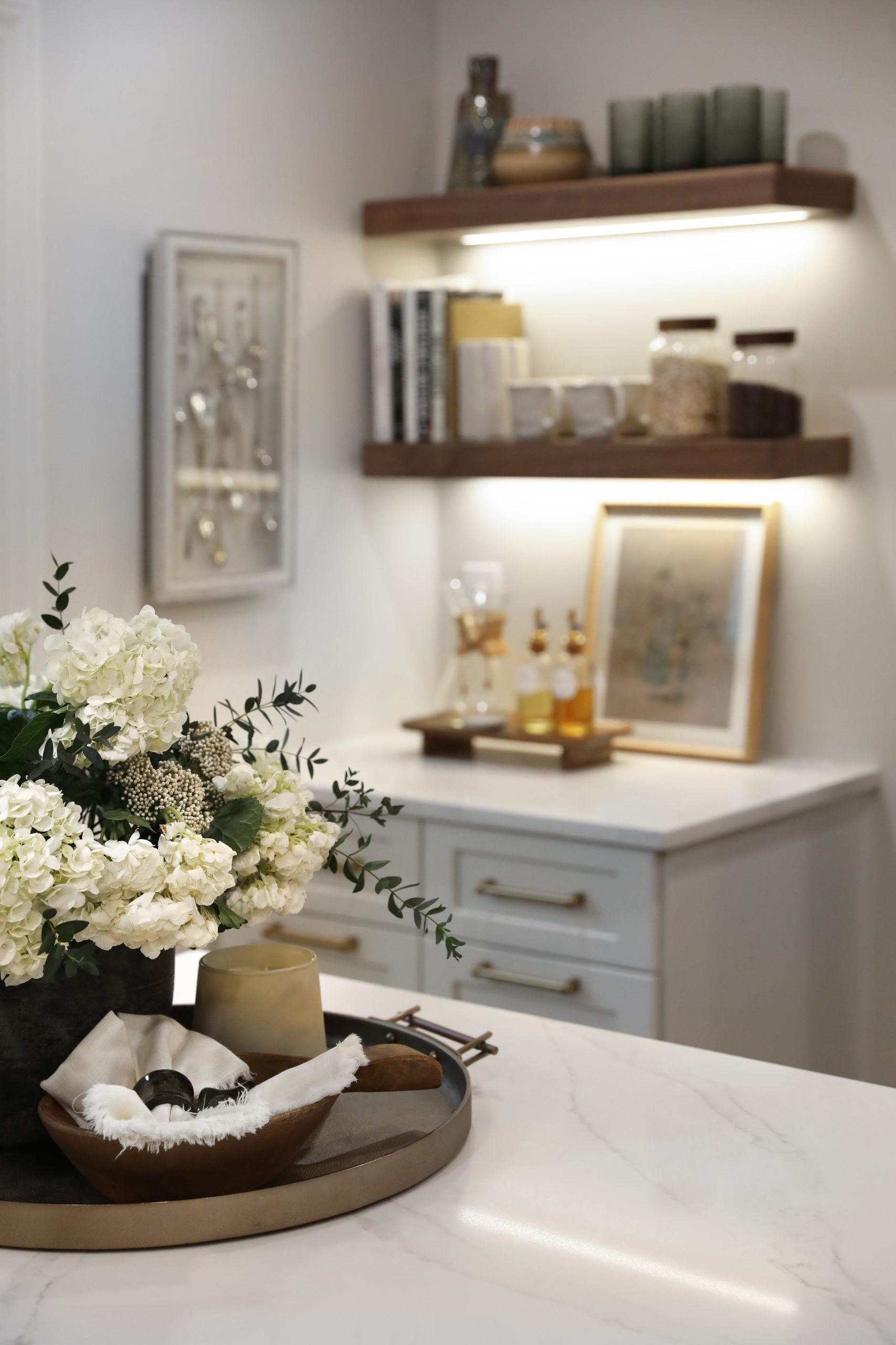 Professionally styled kitchen island and coffee station designed by premiere interior design firm in Pacific Palisades, California, Jennifer Donahue Interior Design Inc