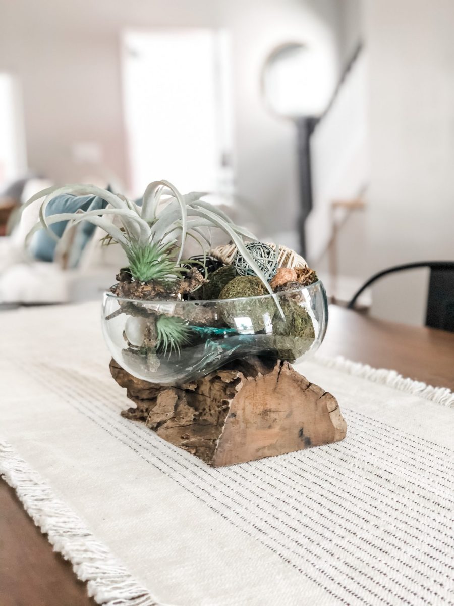 Unique table decor adds charm and intrigue for potential new home buyers.