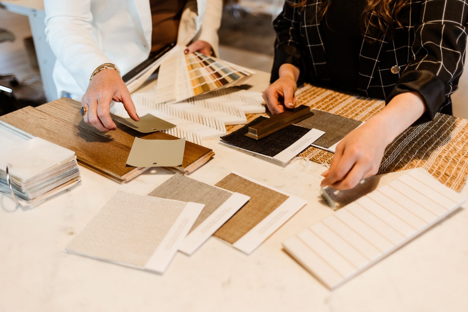 Pacific Palisades, California interior designers selecting colors, materials and styles for their clients.
