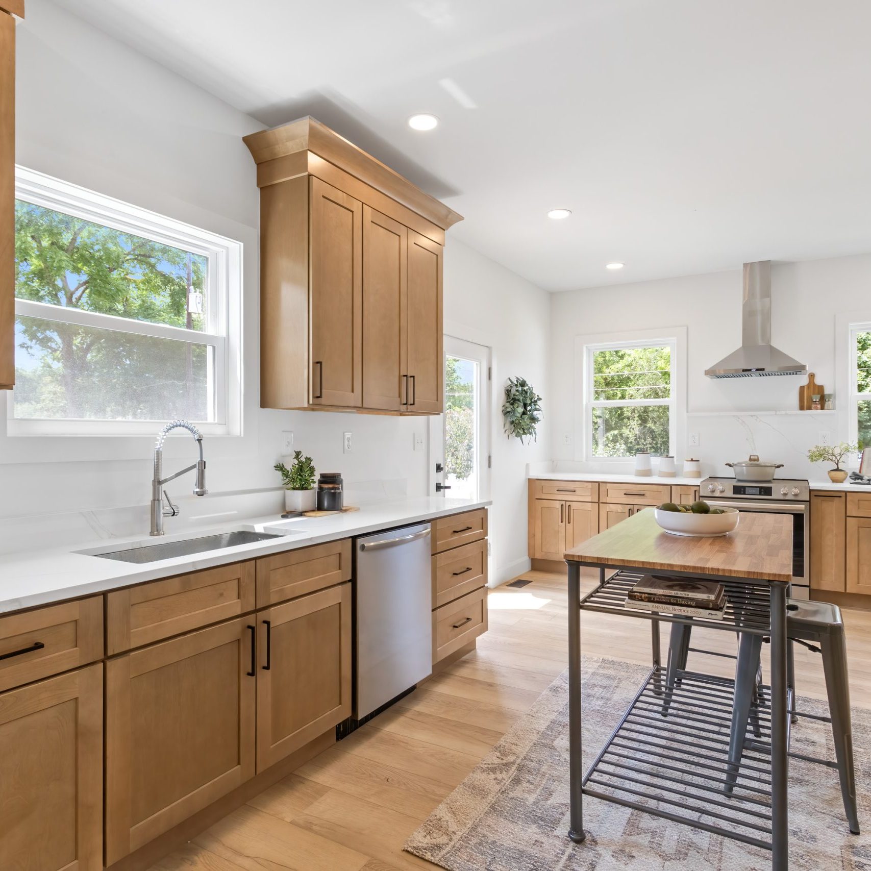 Open concept and fully renovated kitchen boasted tons of cabinet space, lighting and high-end appliances in this Westerville, Ohio remodel.