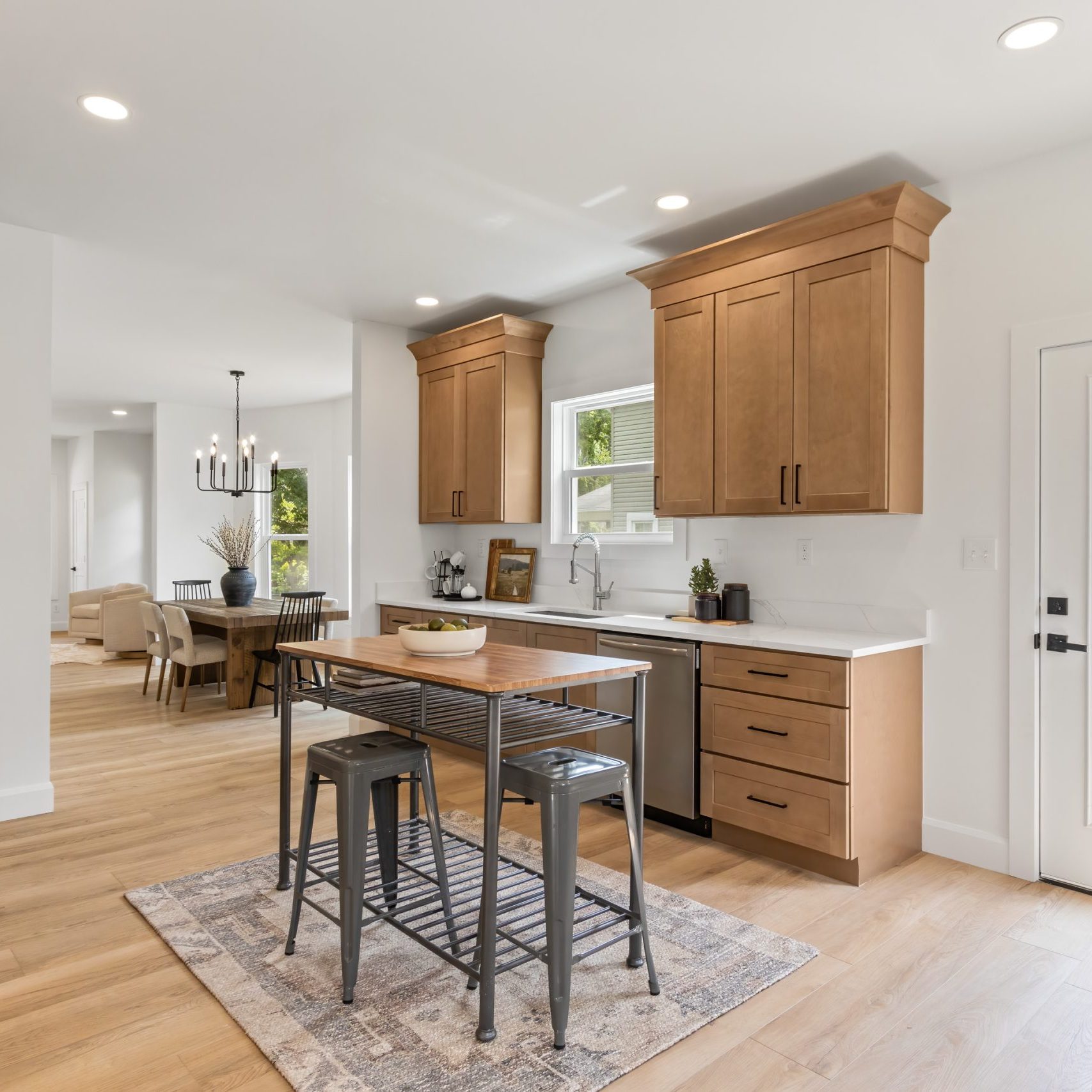 Complete kitchen remodeling for a Westerville home before being listed onto the market. Custom cabinetry and white stone countertops are featured in the design.