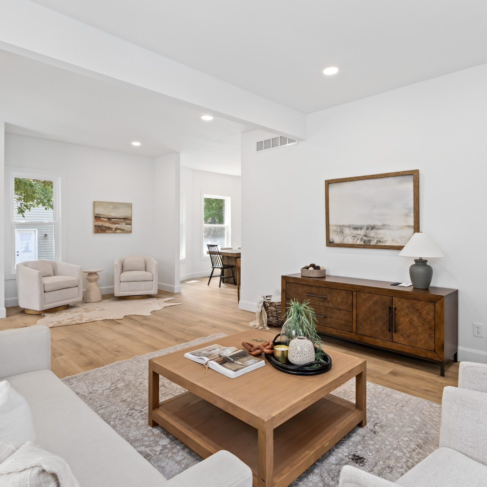 Wide angle shot of a remodeled and professionally staged living room in a Westerville, Ohio home.