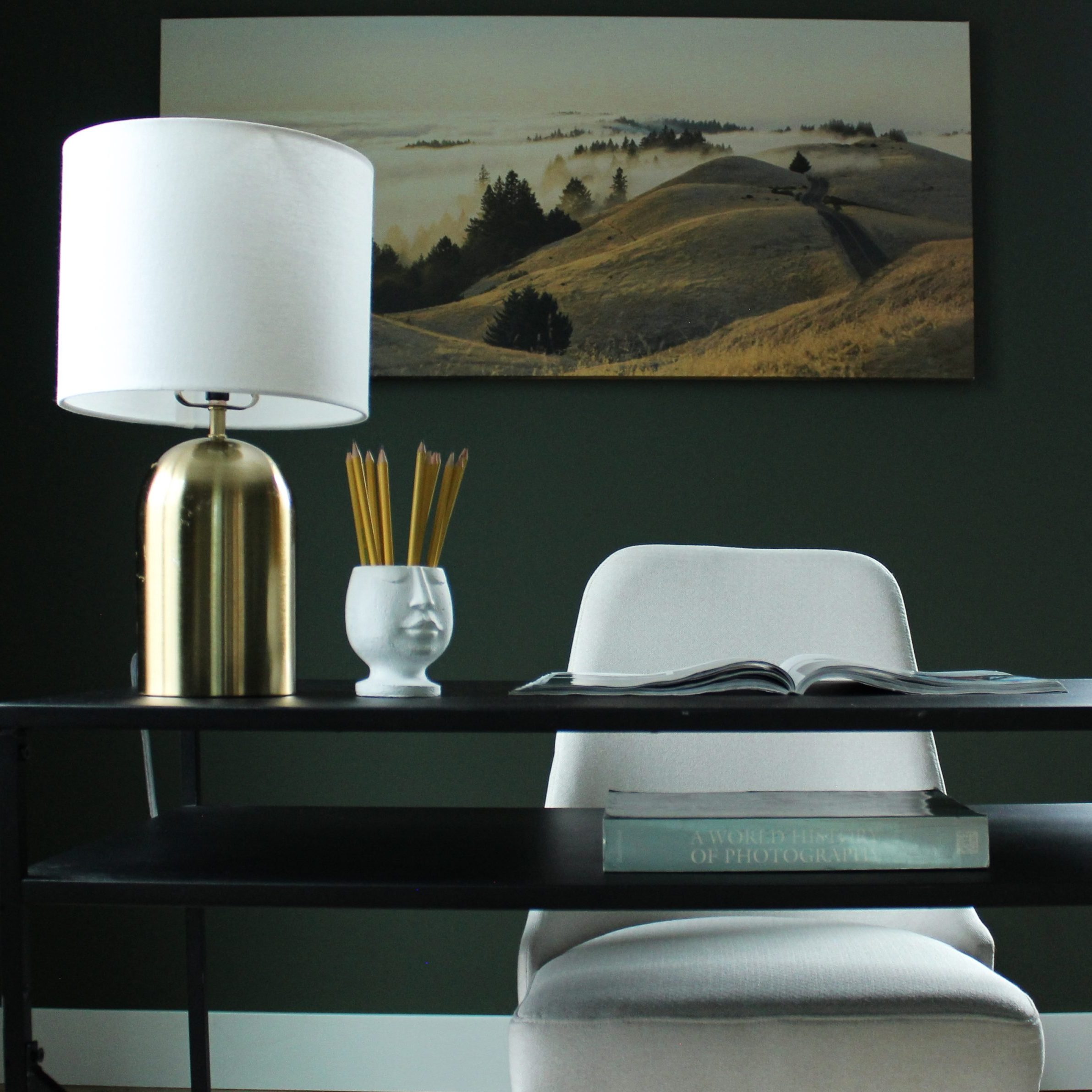 Home office in German Village remodeling with a deep green paint color and modern minimal decor.