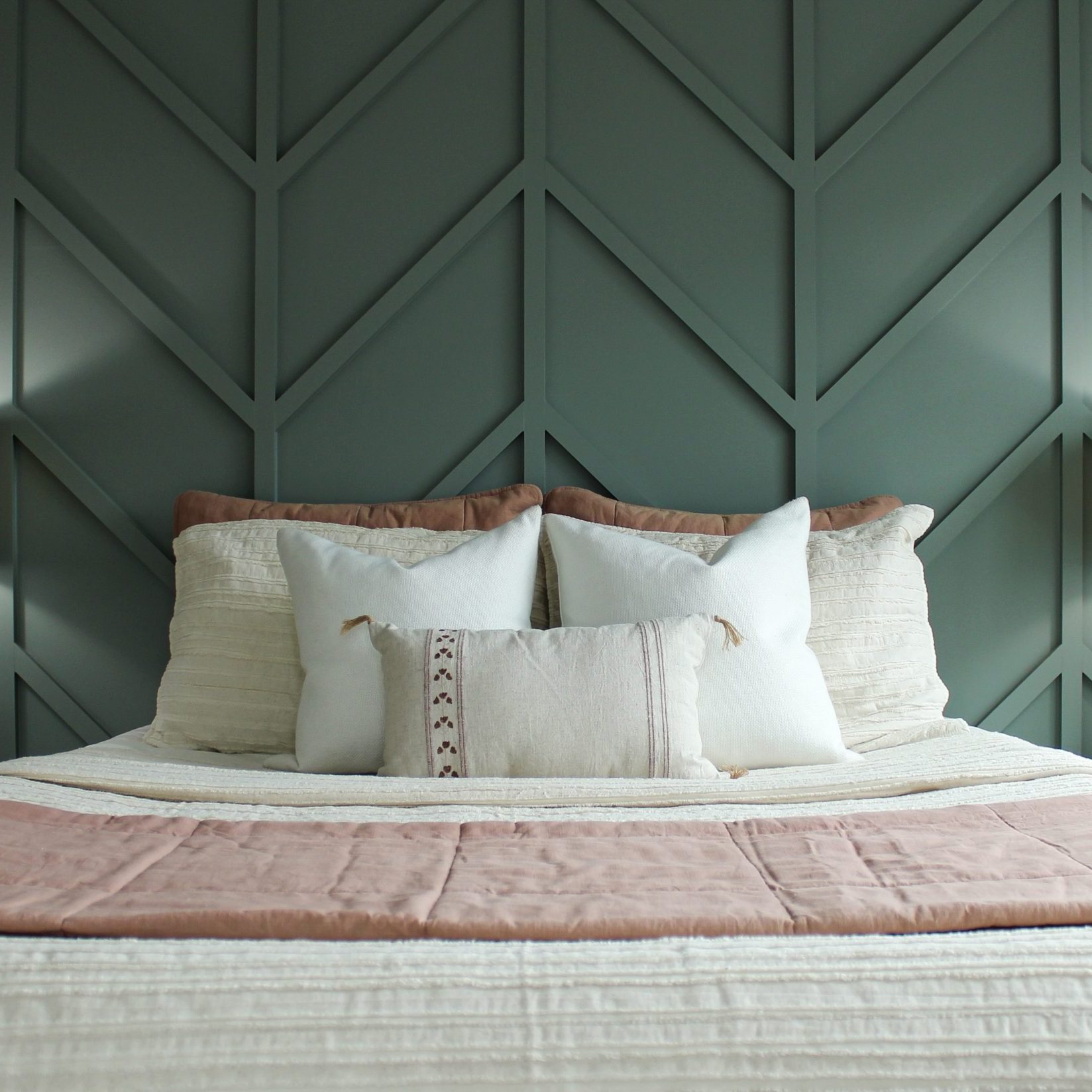 Bedroom remodeling with lattice wall design and green color drenched wall in a Pacific Palisades, California interior home redesign project staged by Jennifer Donahue Interior Design Inc.