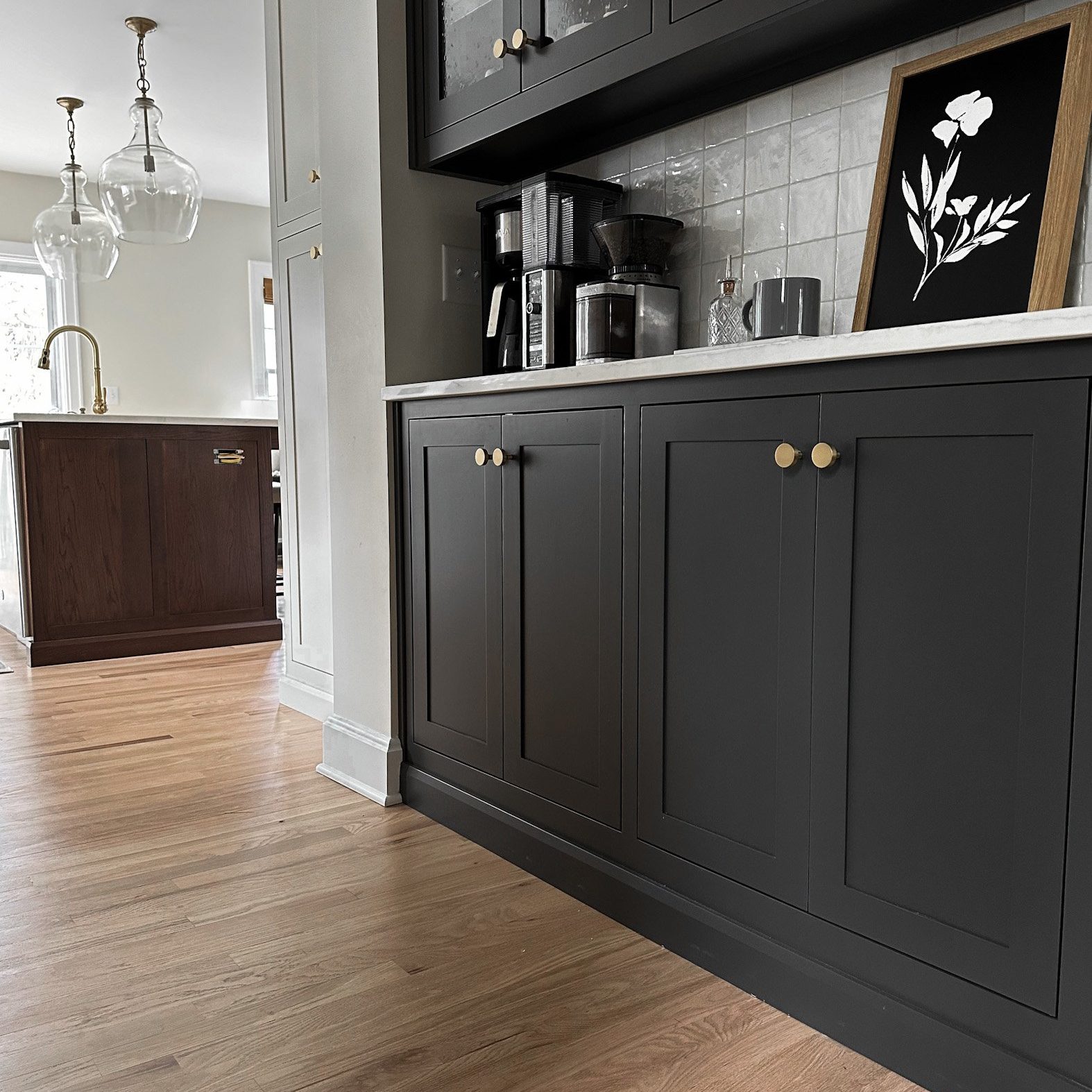 Custom black cabinetry for Pacific Palisades, California interior design client selected and styled by premier interior design service, Jennifer Donahue Interior Design Inc.