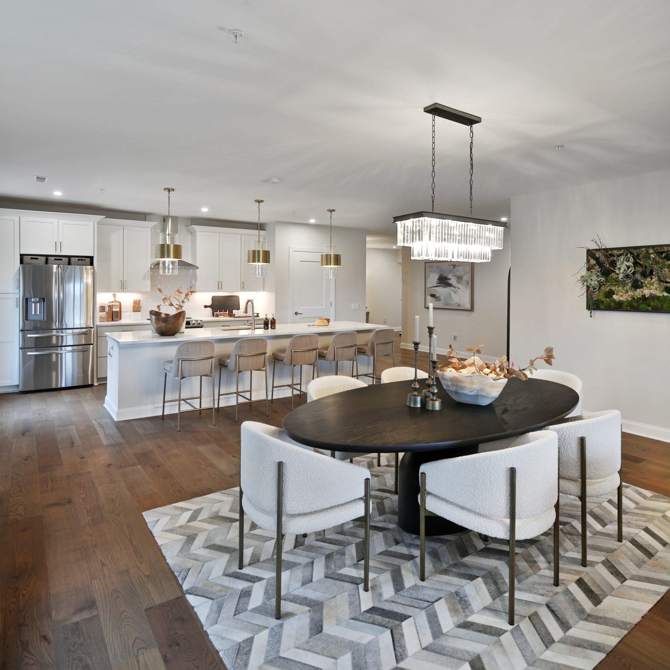 High countertop stools on at kitchen island countertops in luxury condo.