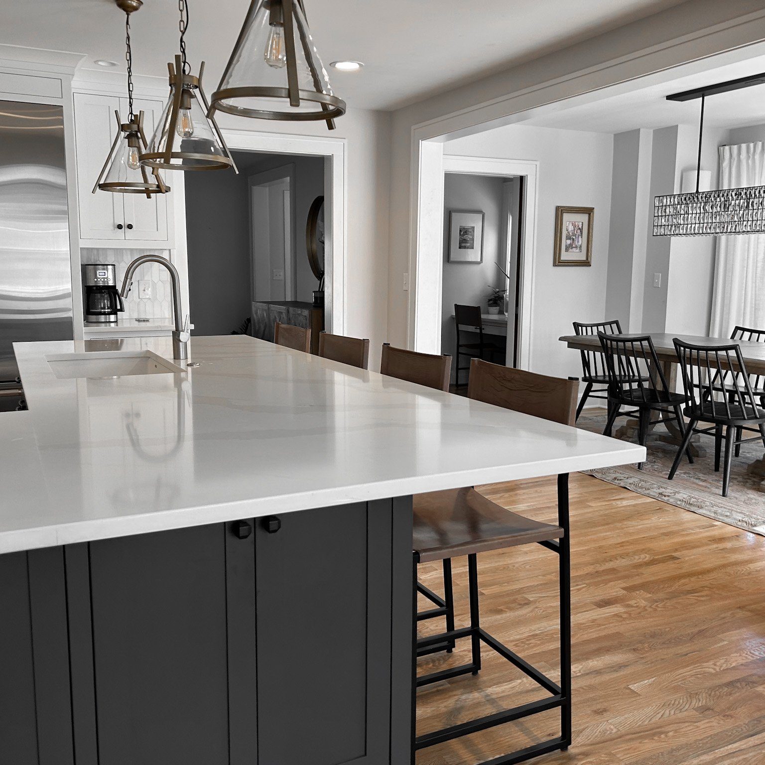 Overlooking from kitchen into the dining room of this Pacific Palisades, California interior design client completed by Jennifer Donahue Interior Design Inc.